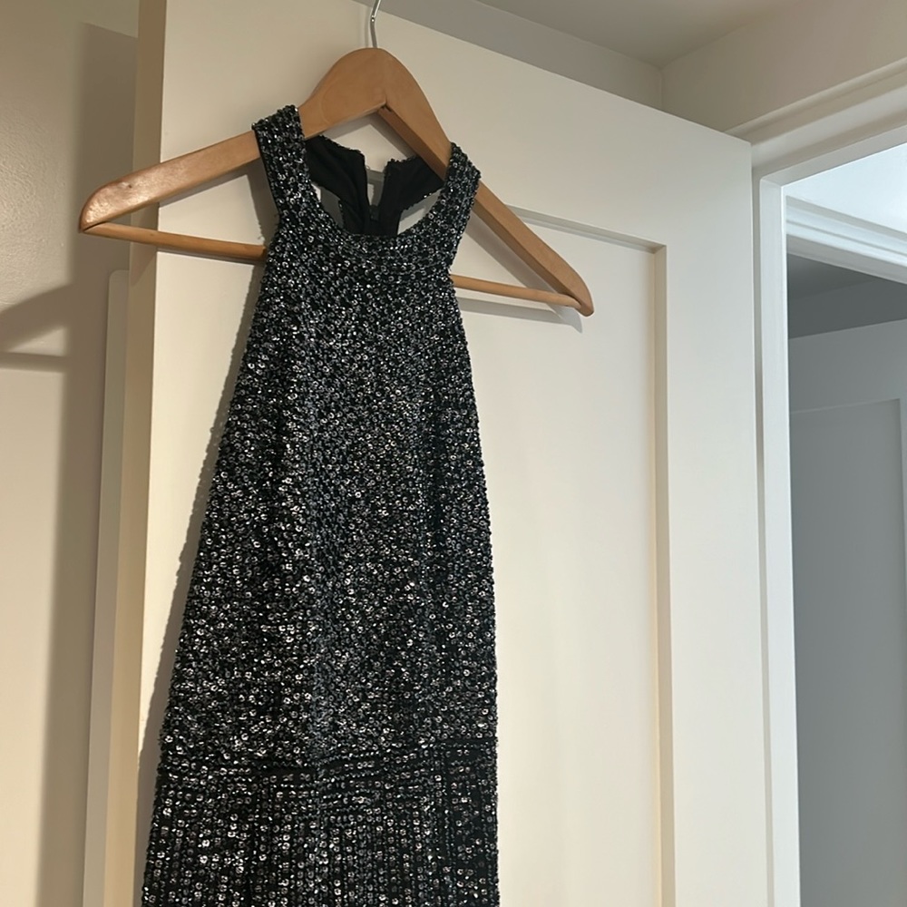 Beautiful evening gown I’m 5’5” and hit my right at ankle with heels. Wore once